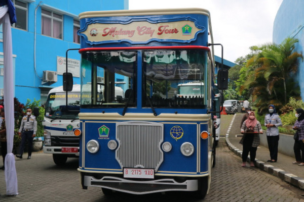 Libur Tahun Baru, Malang Ajak Wisatawan Tur Keliling Kota dengan Bus Klasik