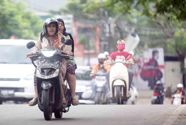 Tips Aman Bonceng Anak Naik Motor Agar Selamat Sampai Tujuan!