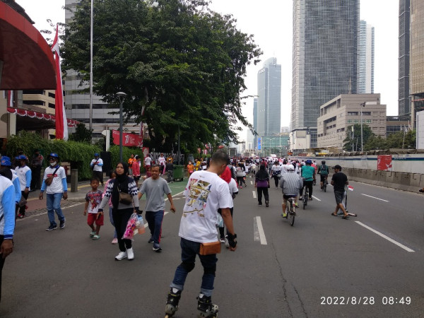 Begini Suasana Kirab Merah Putih Bercampur CFD di Monas-Bundaran HI
