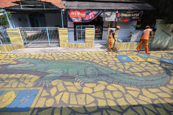 Kreatif! Permukiman Warga di Jakarta Utara Dipercantik dengan Lukisan Mural yang Mengedukasi