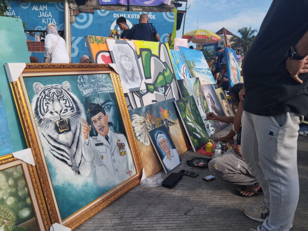 Melihat Aksi Komunitas Mural Depok yang Menyedot Perhatian Pengunjung CFD Margonda